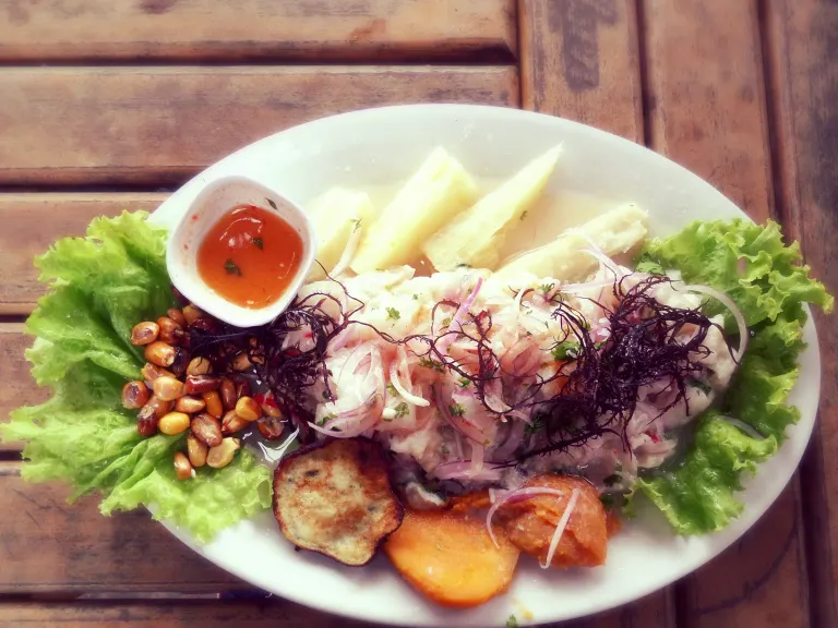 Ceviche is a dish of marinated raw fish or seafood